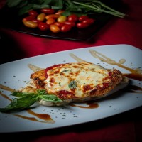 PECHUGA A LA PARMESANA
